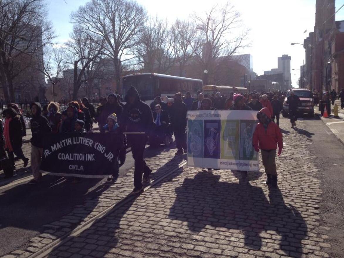 Participants in Cincinnati's annual MLK march walk to Music Hall.